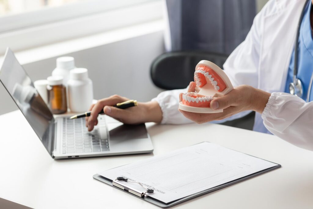 Dentist providing a dental prescription